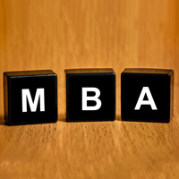M B A on letter blocks