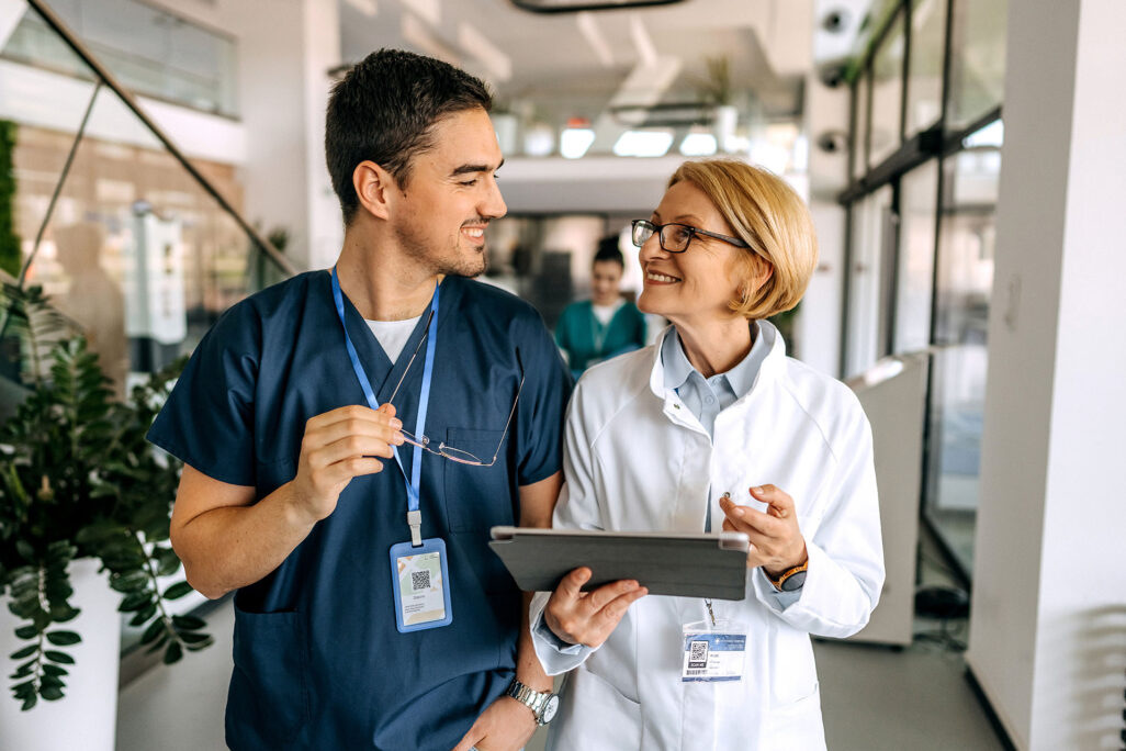 bdt_msn_image-1 Student nurse walking with administrator in hospital